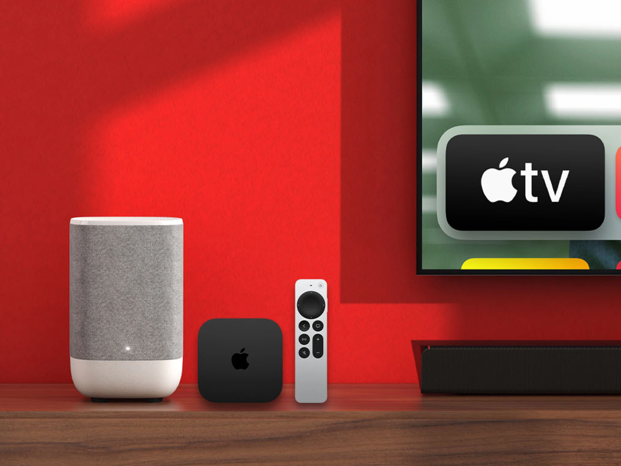 Vodafone Pro II router with Apple TV 4K devices on a TV stand in a red living room.